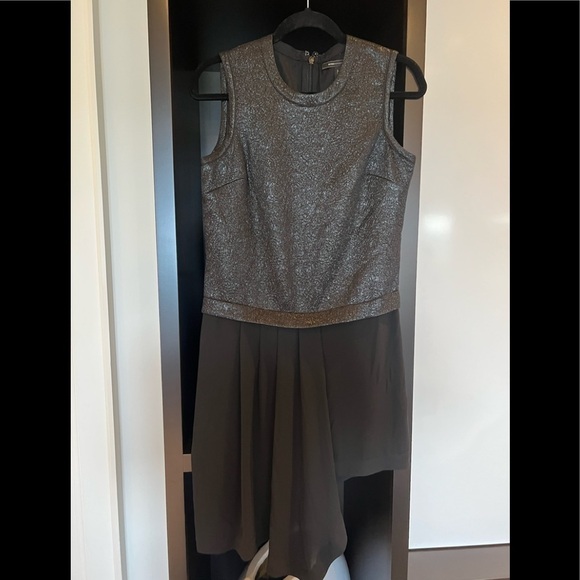 BCBG black dress. Great for that special party or at the office. - Picture 1 of 3